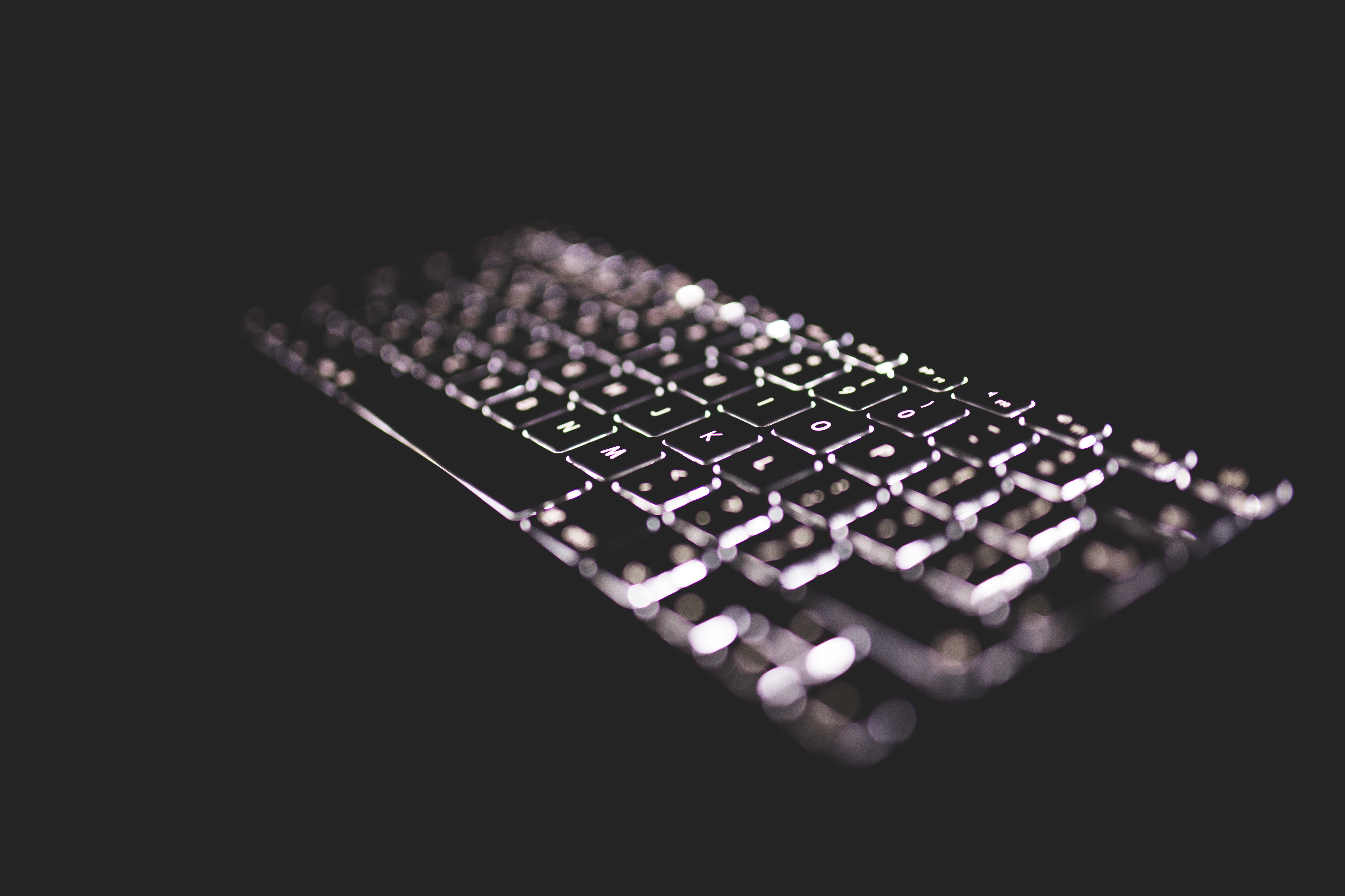 backlit keyboard with dark background chatbot FAQ Are chatbots ethical?